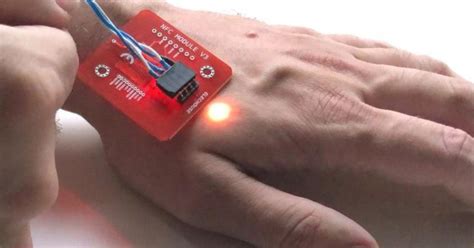 nfc reader for under skin|The microchip implants that let you pay with your hand.